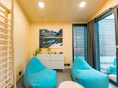 Children’s room with two bean bag chairs and various toys
